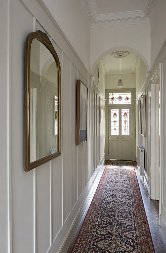 9 Ways to Decorate a Victorian Terrace: Ideas for 2026 6 Vertical MDF wall paneling painted to match the upper walls.