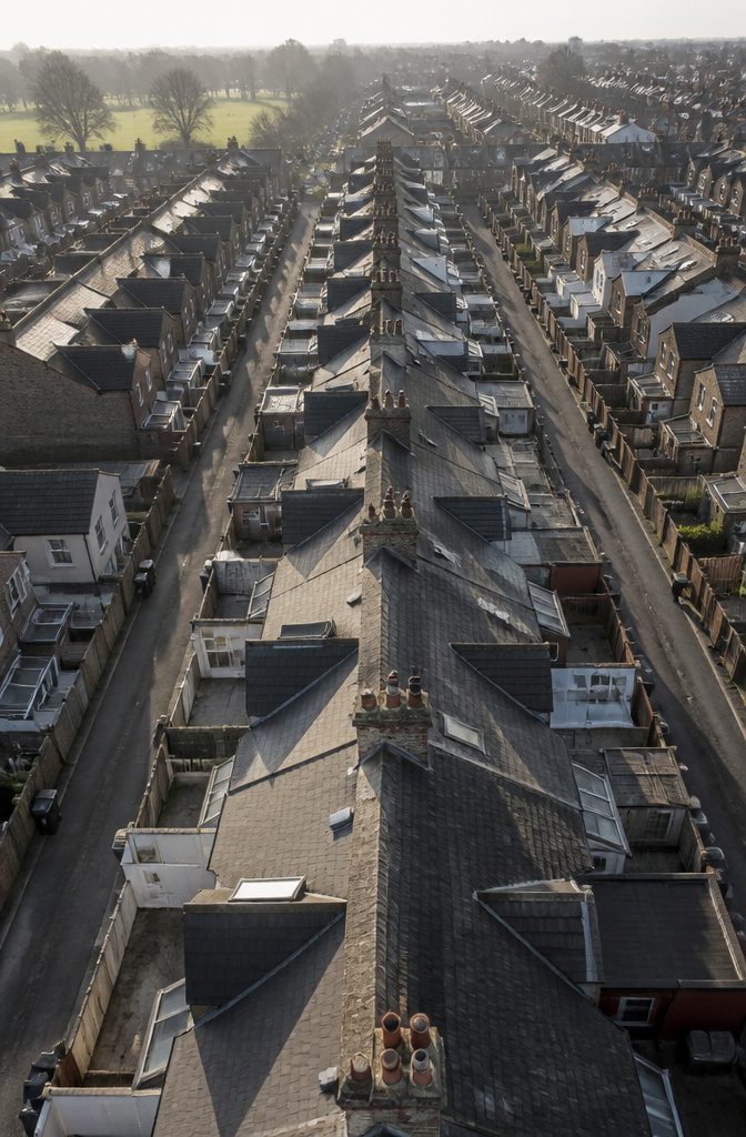 Two rows of back-to-back terraced houses sharing a single rear wall.